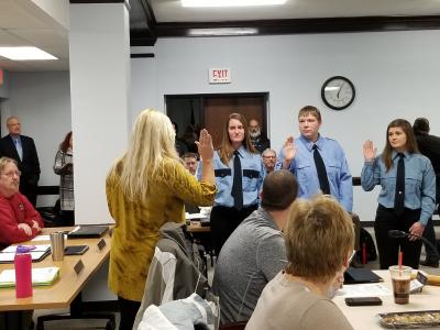 New firefighters being sworn in