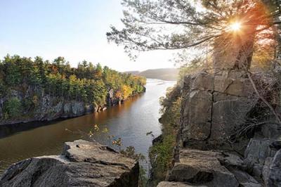 A river flowing down beautiful rocks and trees